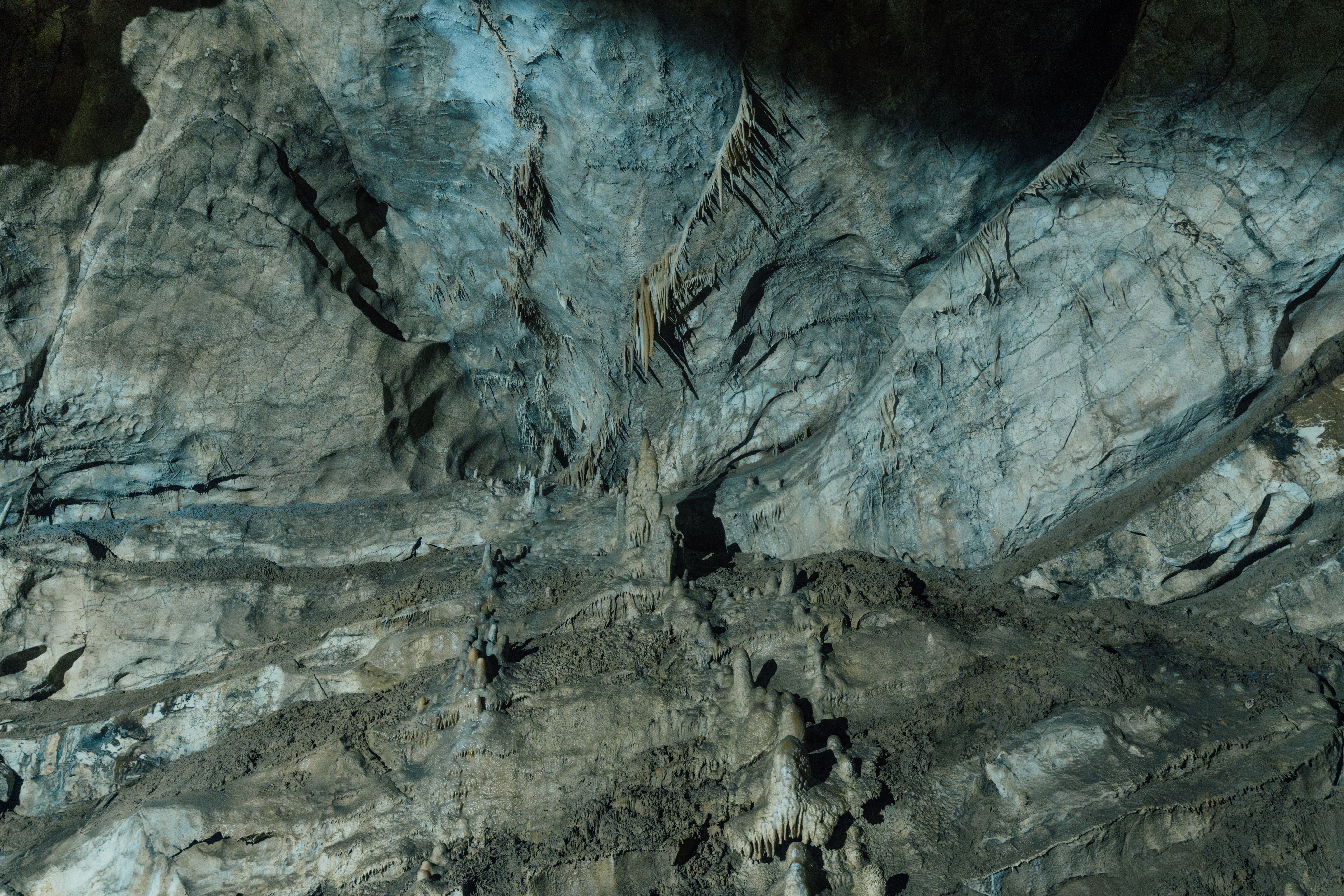 Illuminated stalactites and stalagmites inside Prometheus Cave, Georgia