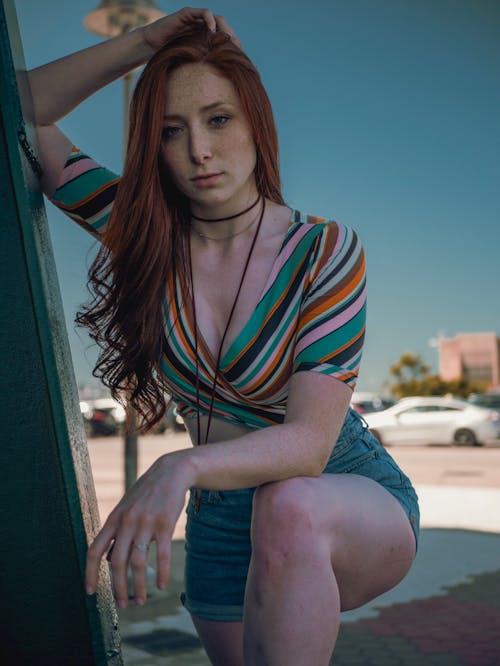 Woman Wearing Multi-colored Crop-top