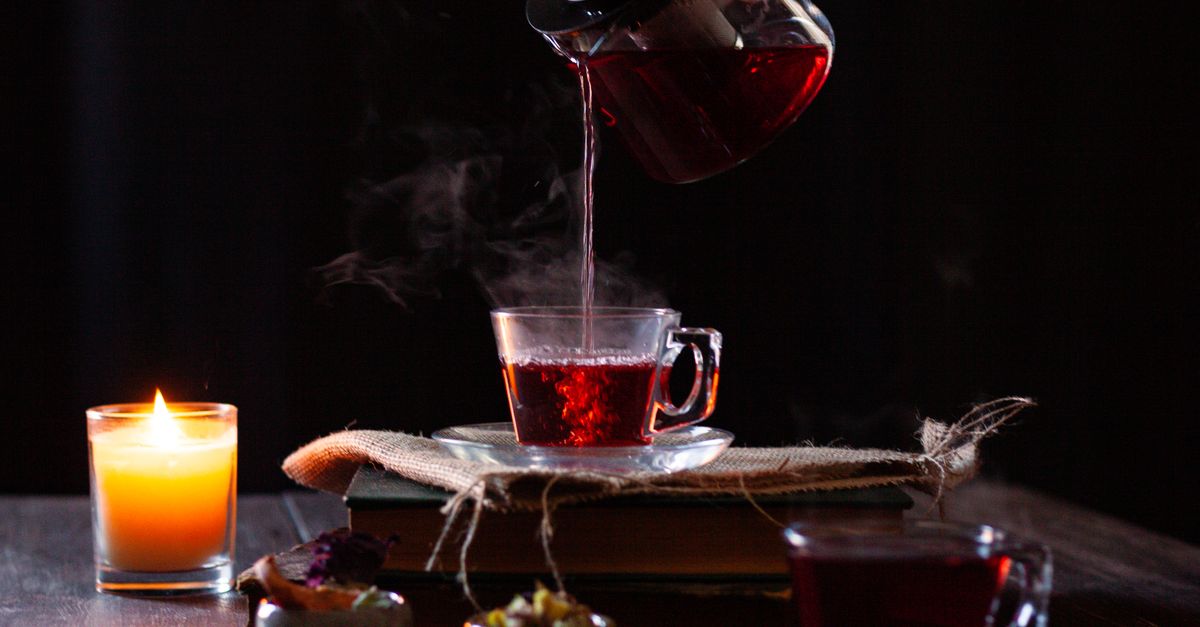 Cozy Evening Tea Ritual with Candlelight · Free Stock Photo