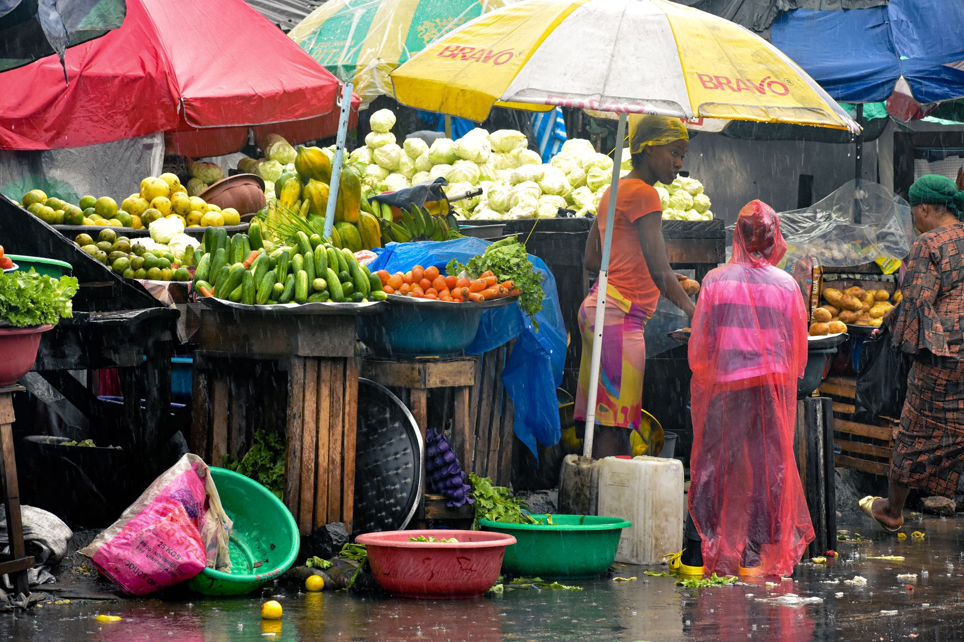 Vibrant Market Scene in Rainy Monrovia, Liberia