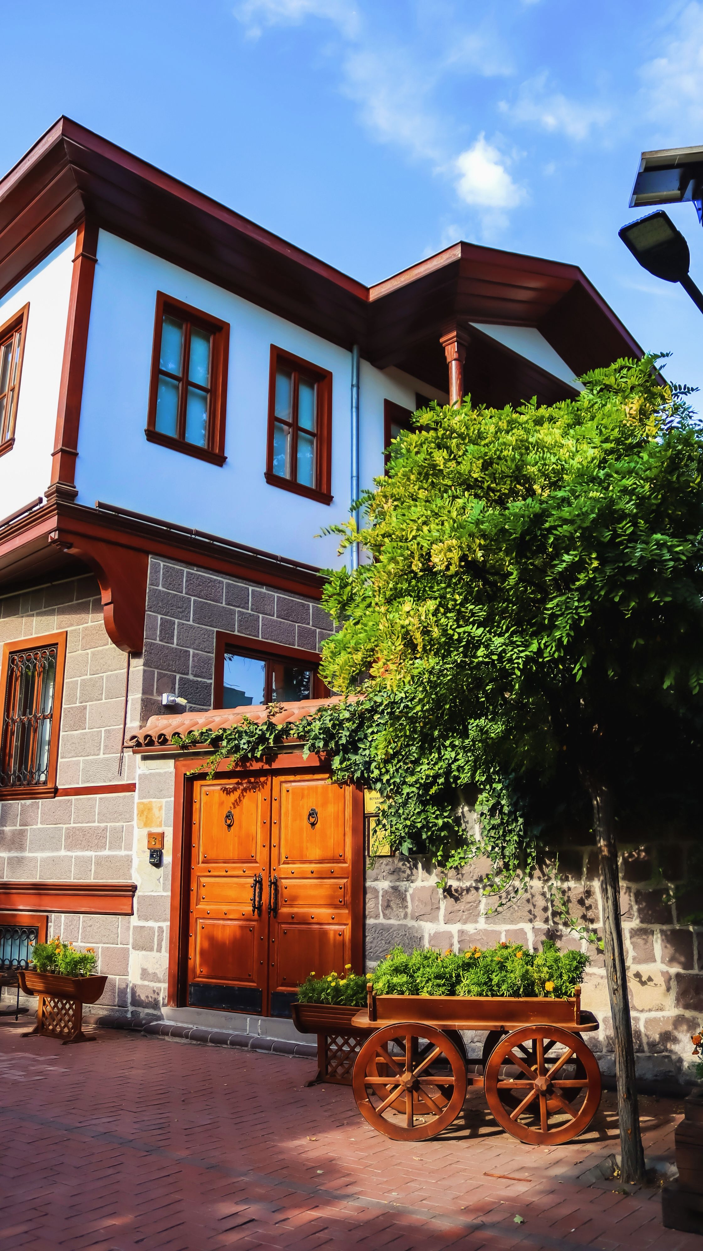 Charming Traditional House with Wooden Accents · Free Stock Photo
