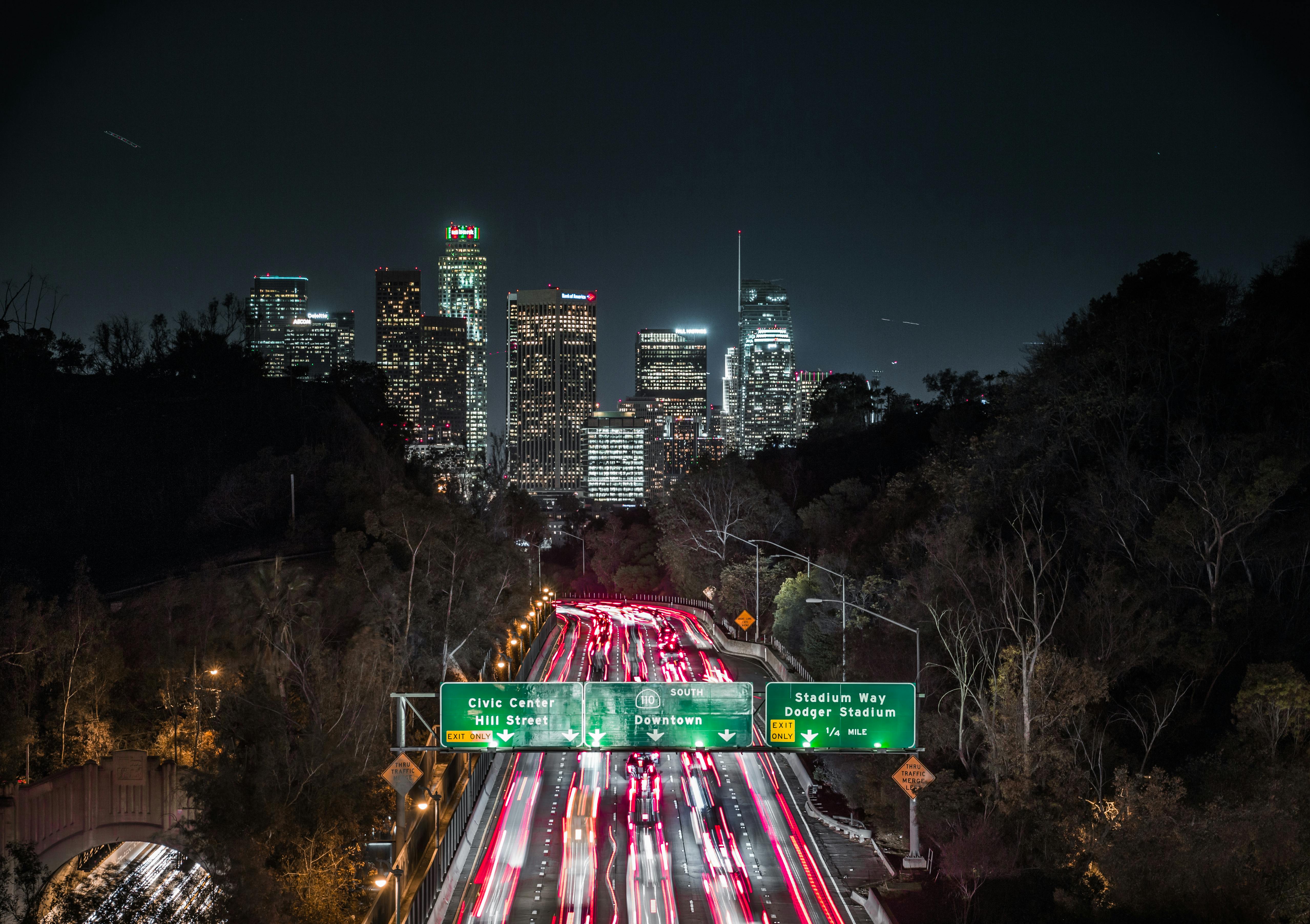 timelapse photo of city street at night