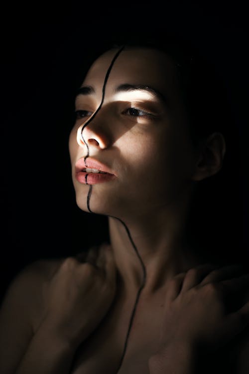 Free Woman With Black Mark in Between Face Stock Photo