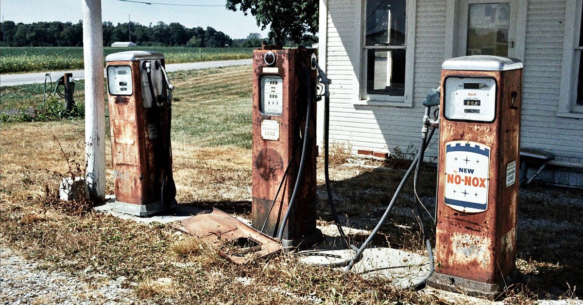 Rustic vintage gas pumps at an old station in Waldo, Ohio.