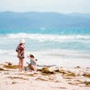 Children Playing at a Sandy Beach