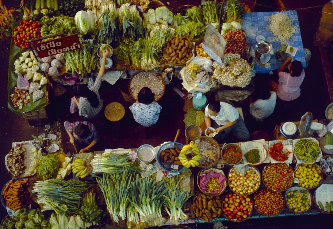 Overhead view of a colourful Thai fresh produce market
