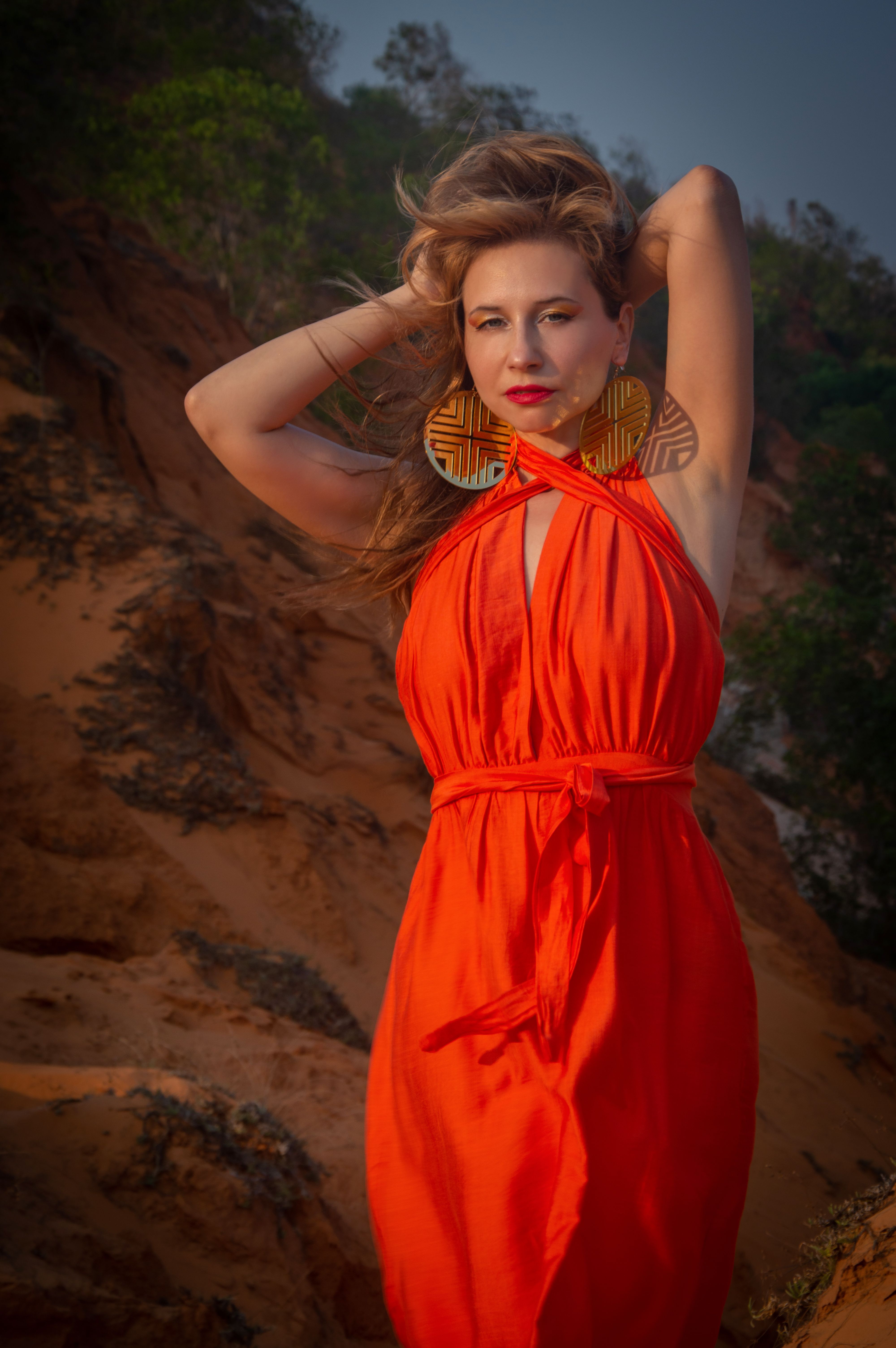 Woman in Red Dress Posing Outdoors · Free Stock Photo