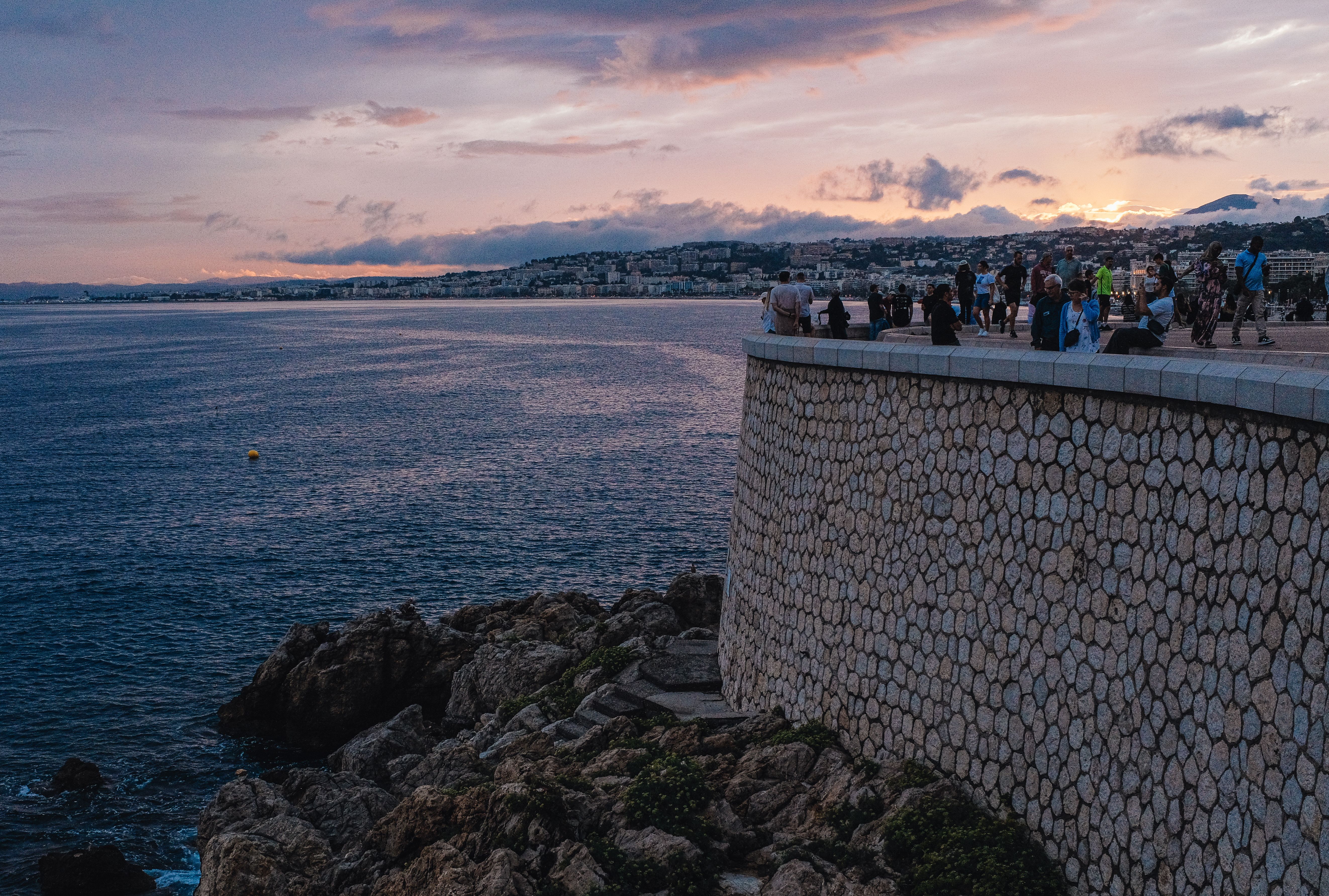 Sunset over Coastal Promenade with Scenic View · Free Stock Photo