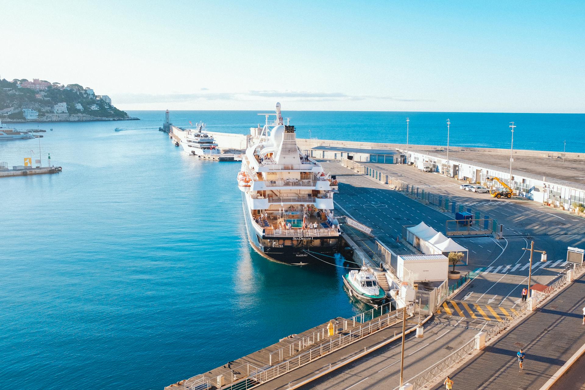 Cruise Ship Docked at a Bustling Port