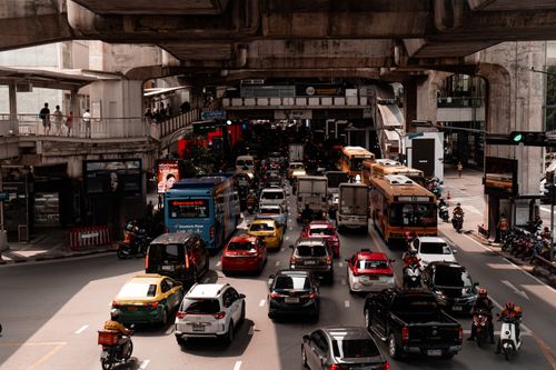 Free A busy traffic scene in downtown Bangkok, showcasing congestion under a flyover. Stock Photo