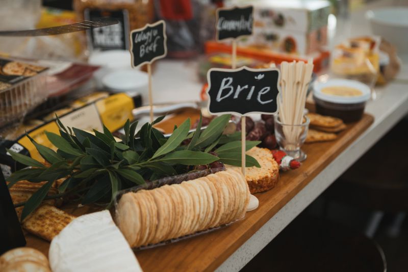 whipped feta dip with crackers arranged around it