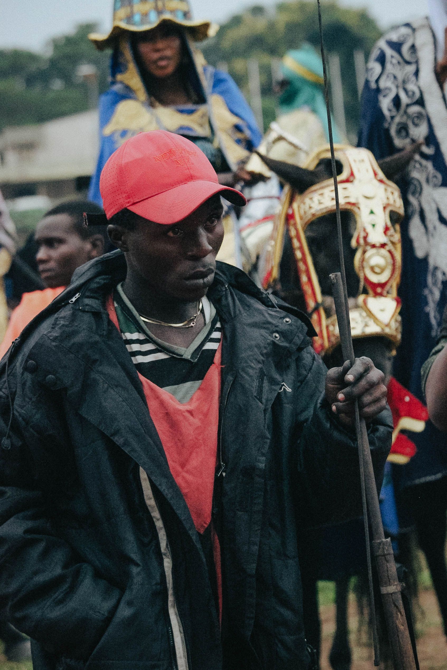 Man in Red Cap at Cultural Celebration · Free Stock Photo