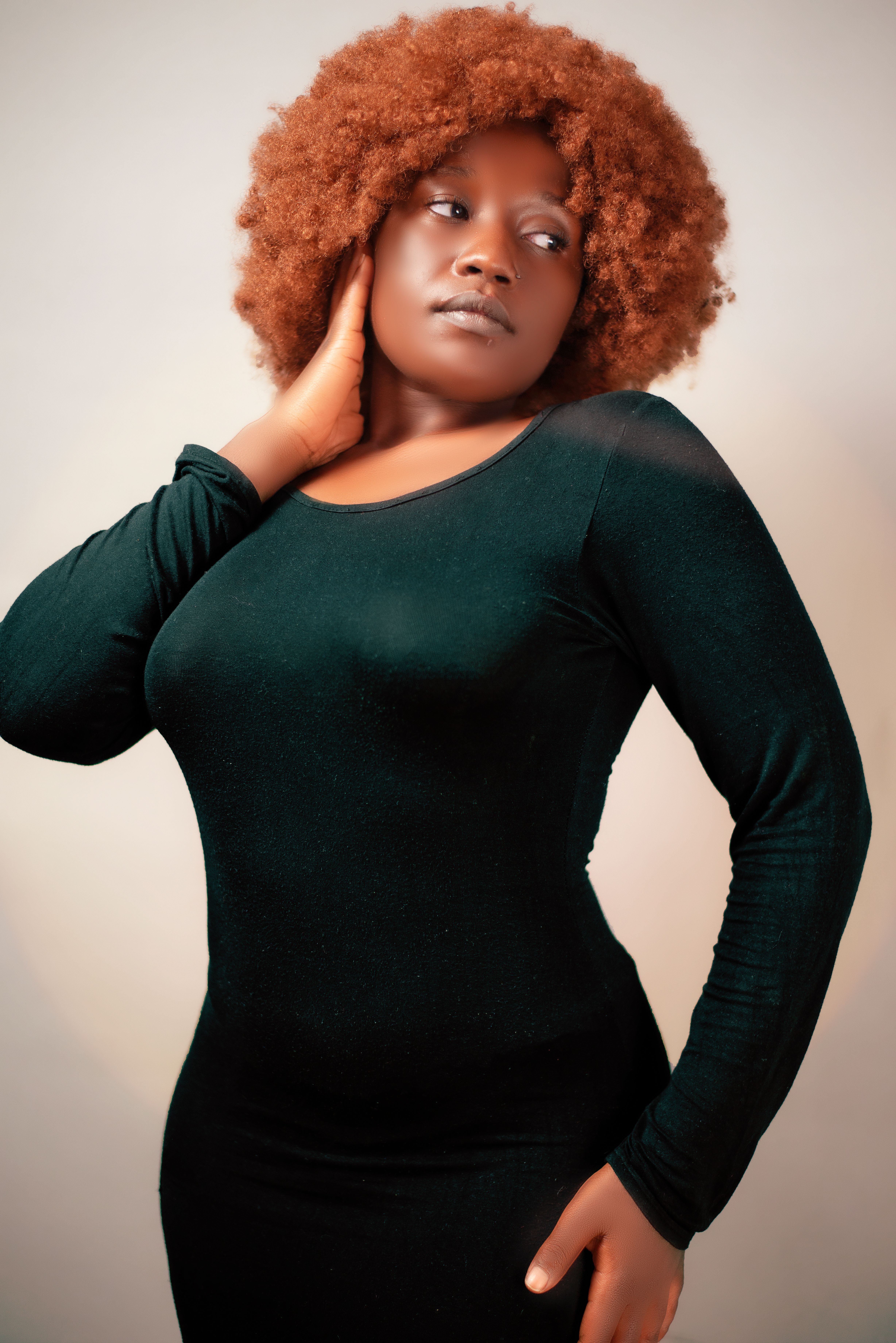 Portrait of Stylish Woman with Curly Hair · Free Stock Photo