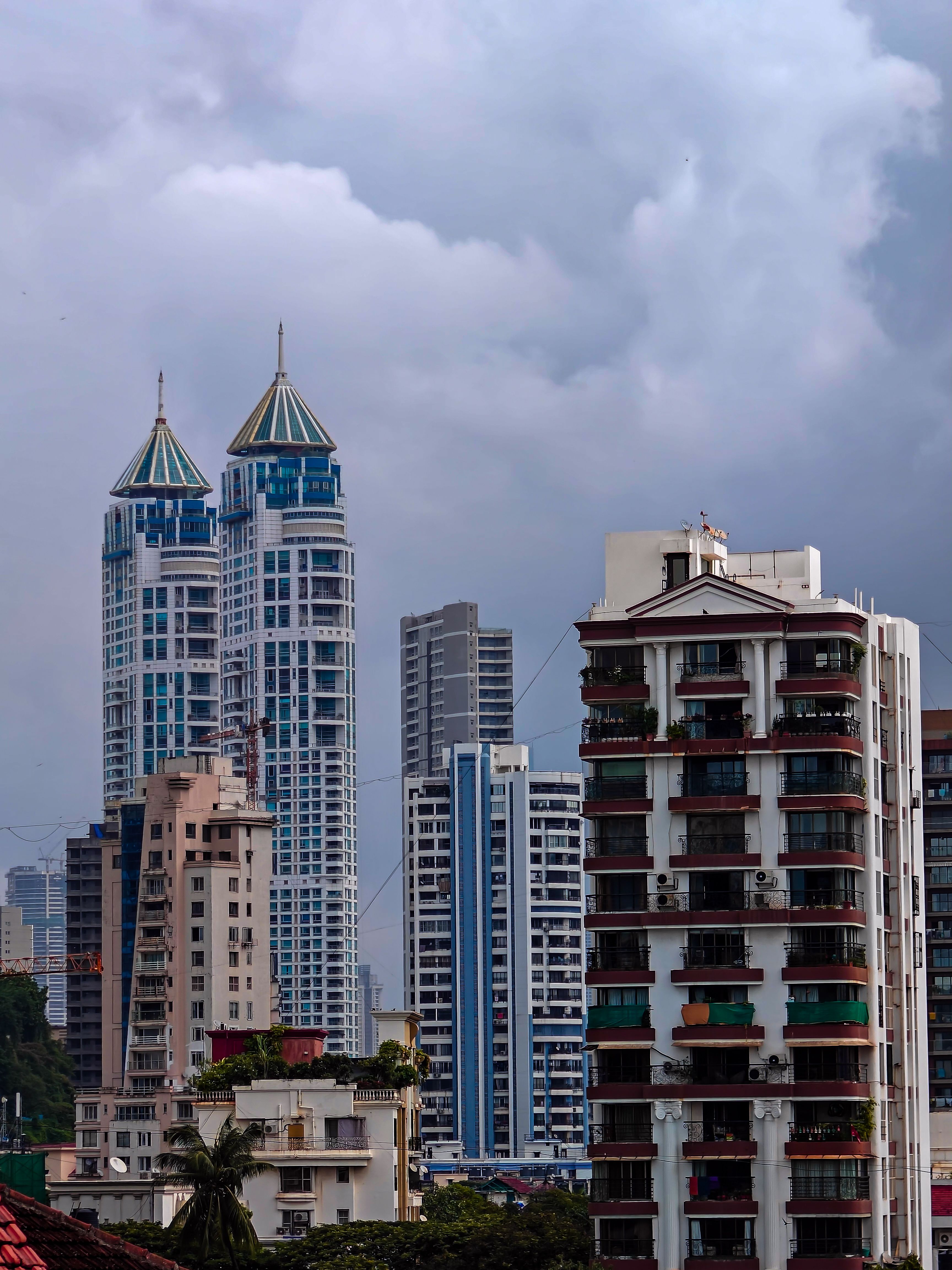 Residential Buildings Under Cloudy Sky · Free Stock Photo