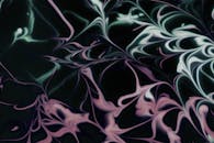 Abstract Swirling Pastel Patterns on Dark Background
