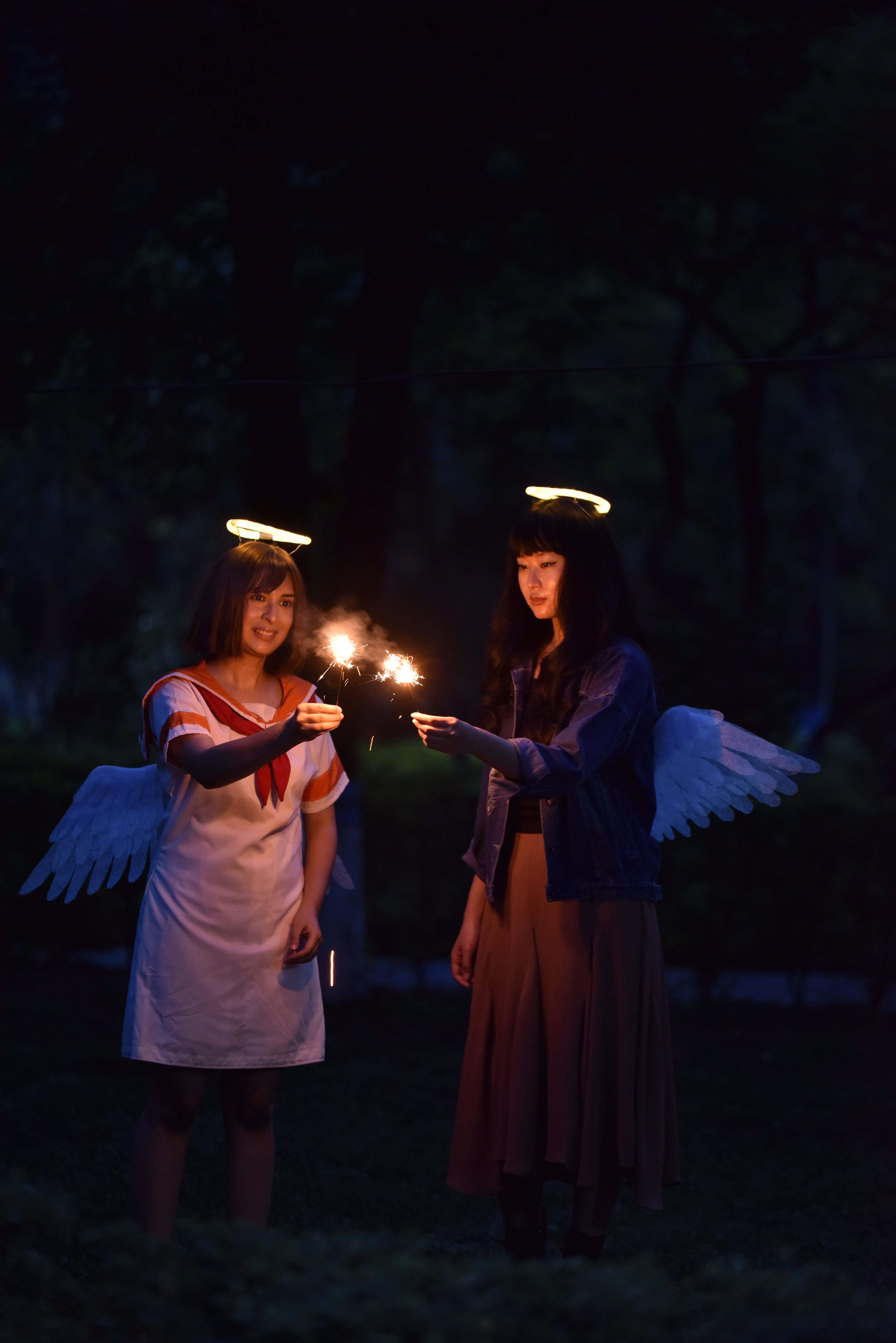 Evening Cosplay Photoshoot with Angel Wings · Free Stock Photo