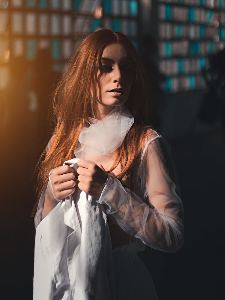 Woman In White Sheer Top