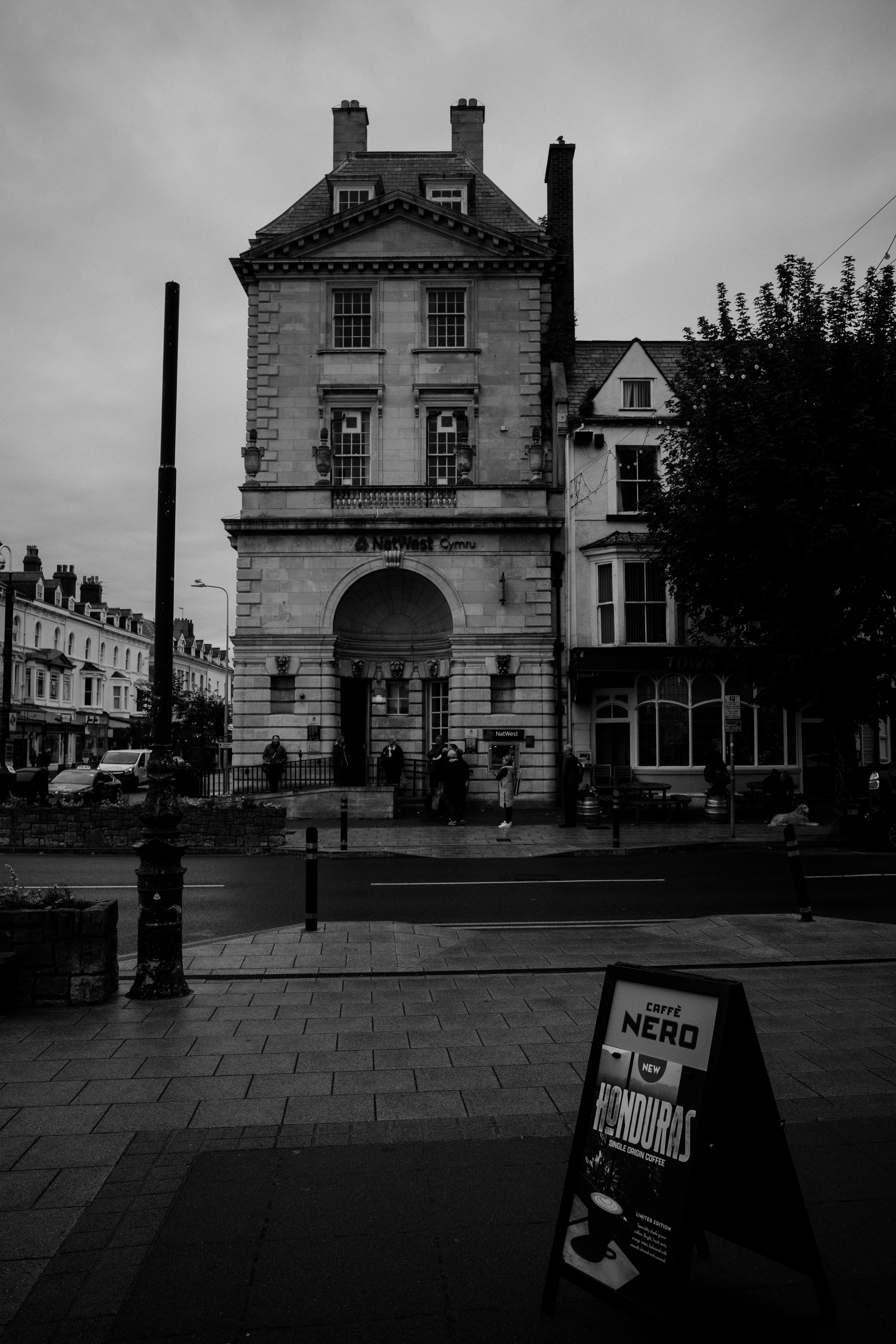 Monochrome view of a historic building in Llandudno, Wales.