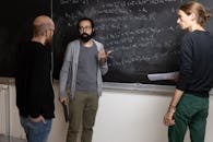 Mathematicians Collaborate on Chalkboard Equations