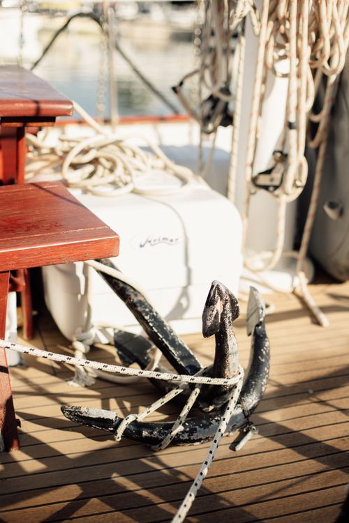 Free Close-up of an anchor and ropes on a boat deck in Zadar, Croatia, under sunlight. Stock Photo