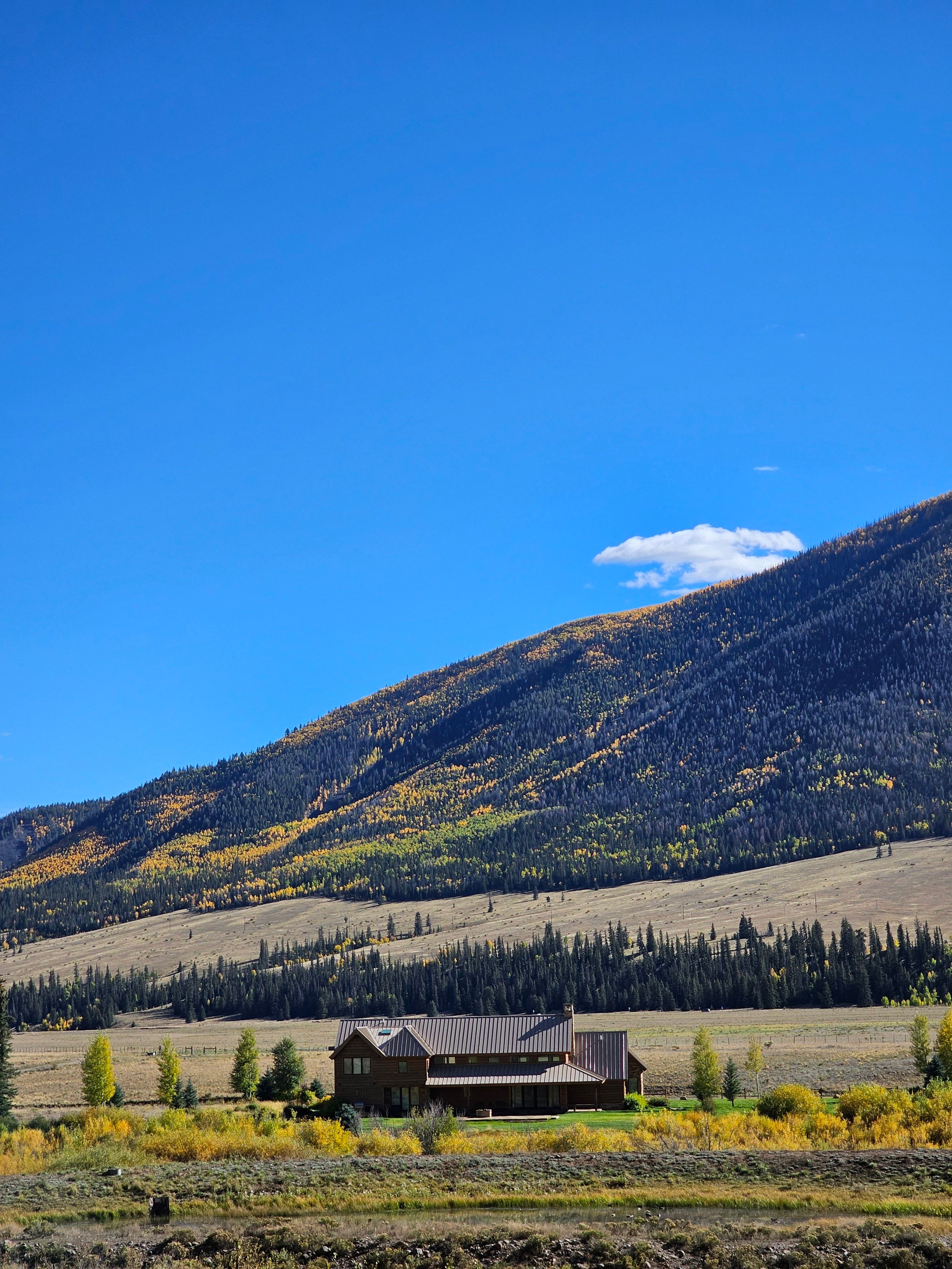 Rustic Cabin in Colorado Mountain Landscape · Free Stock Photo