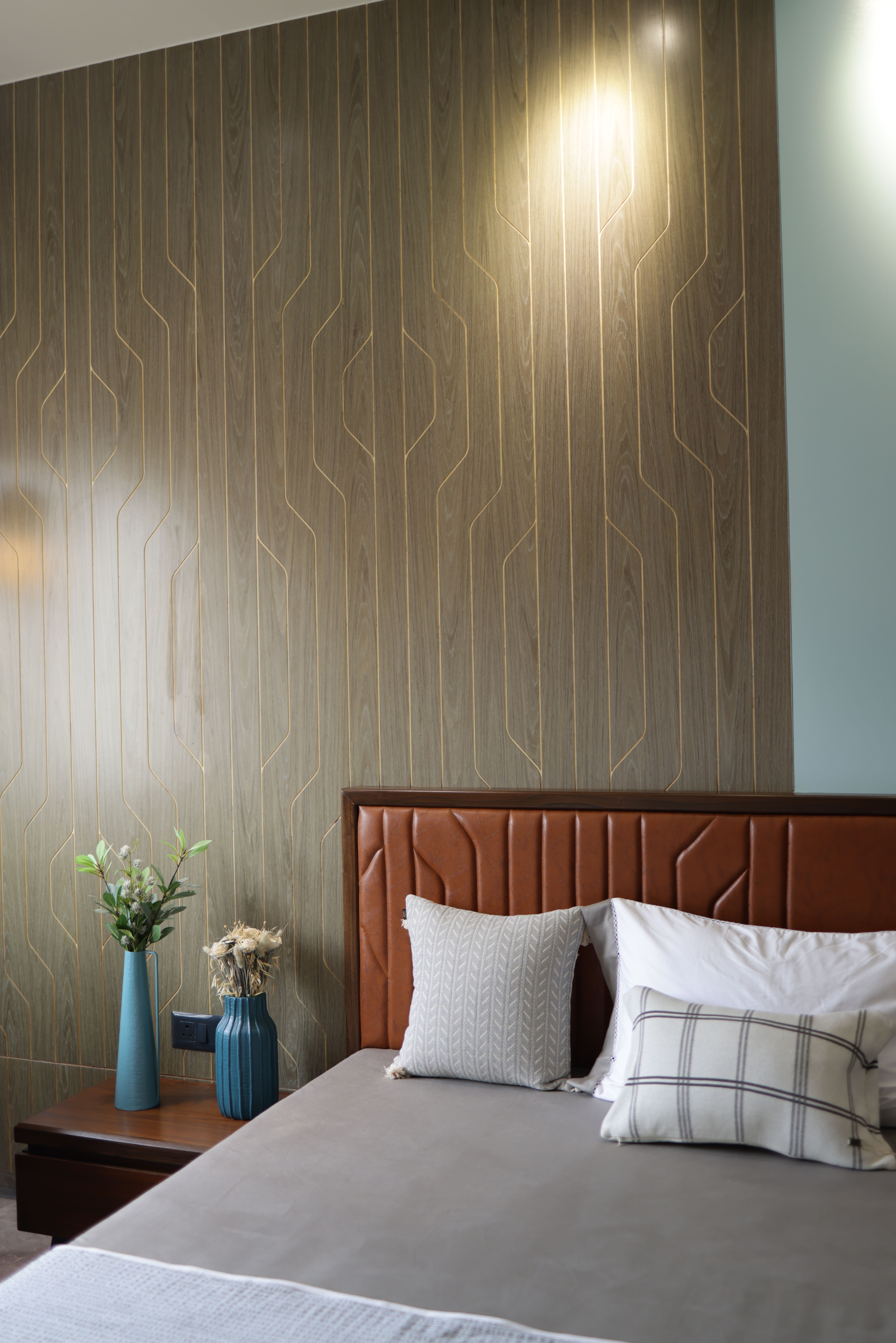 Modern Bedroom Interior with Geometric Wall Art · Free Stock Photo