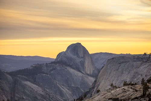 Free Breathtaking sunset view of the iconic Half Dome rock formation in Yosemite National Park. Stock Photo