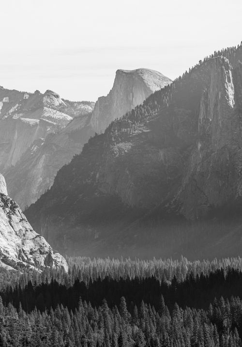 Free Stunning black and white view of Yosemite's Half Dome, capturing serene wilderness. Stock Photo