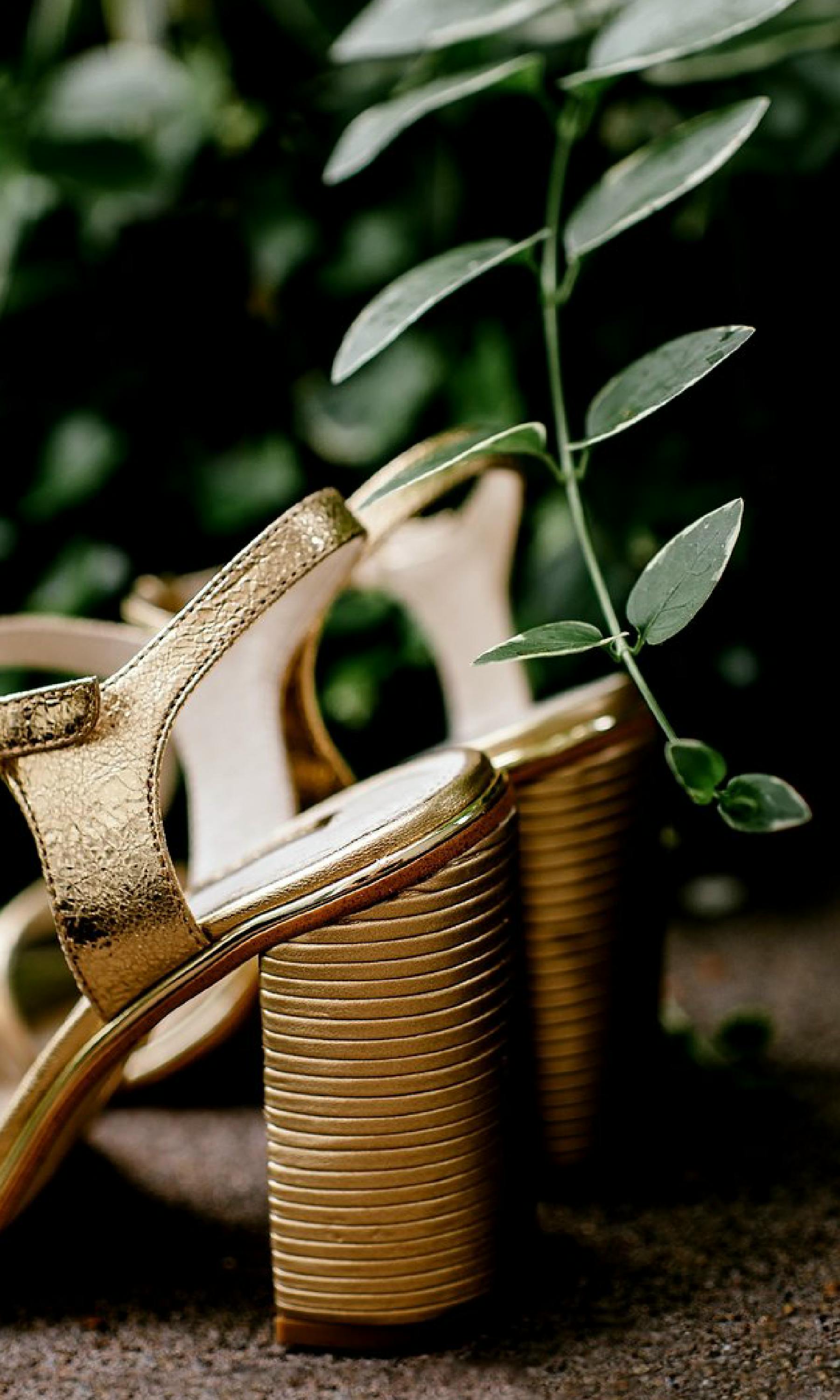 Applying gold leaf details in a luxury garden