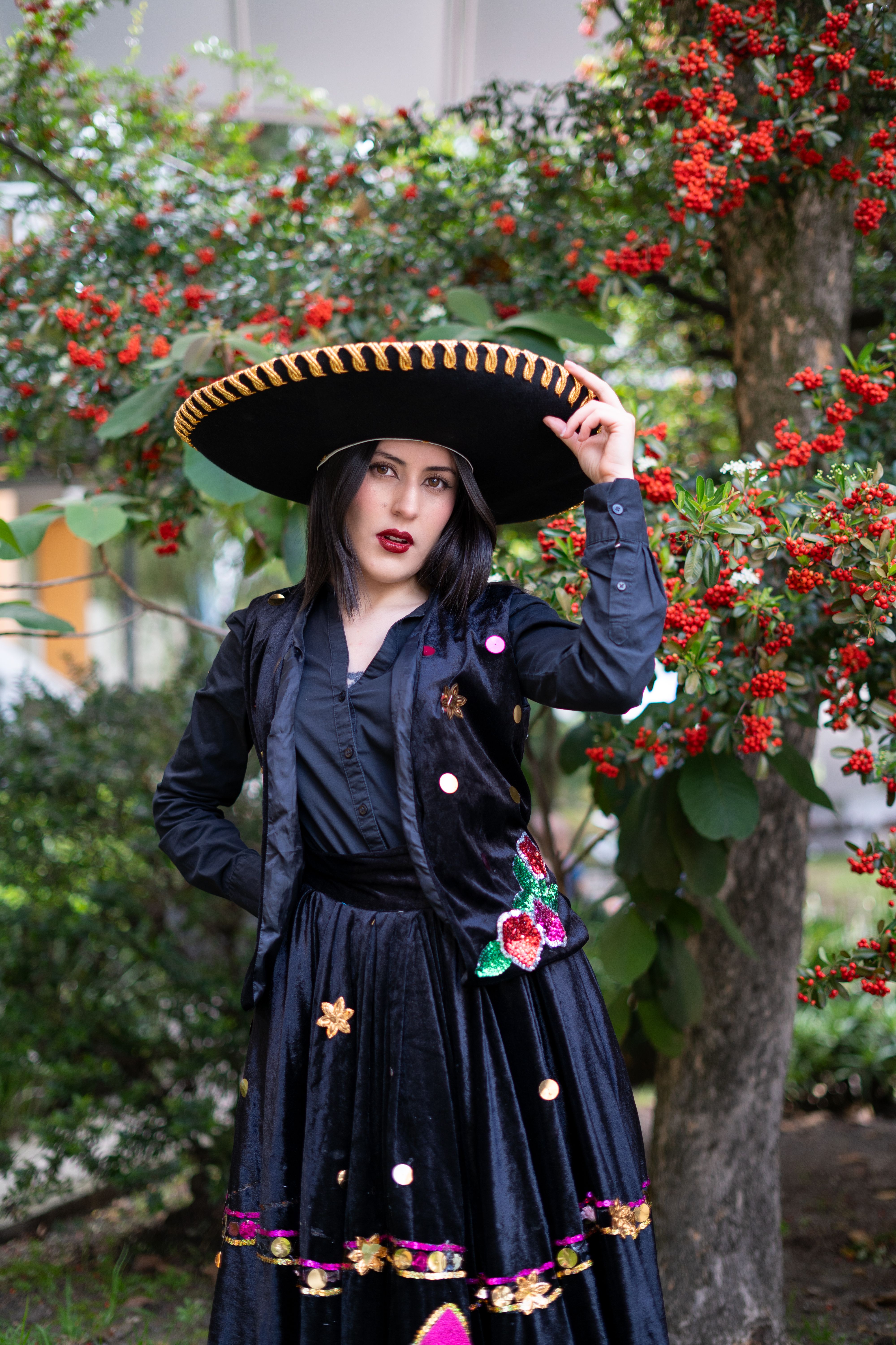 Woman in Traditional Mexican Dress with Sombrero  Free Stock Photo