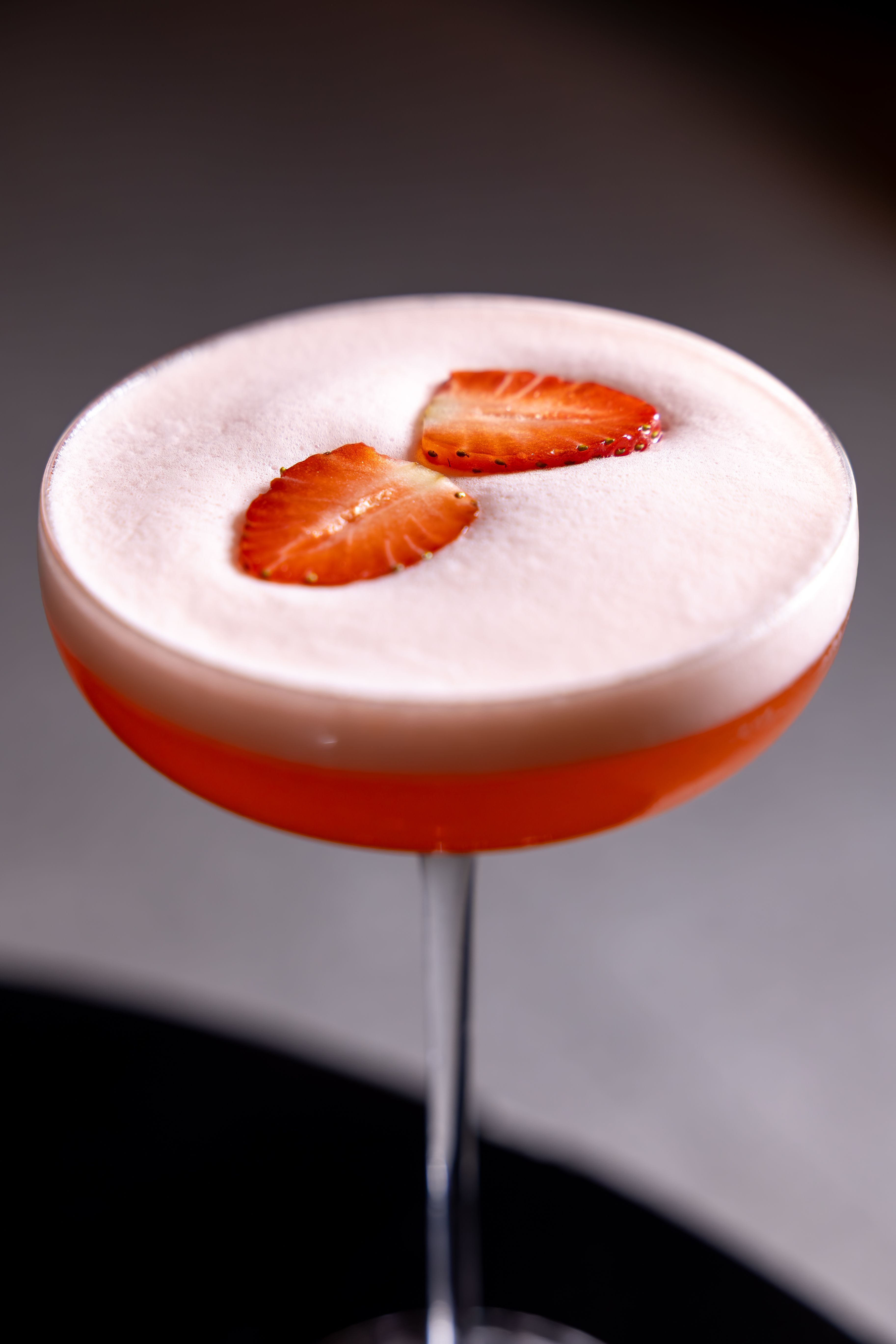 Elegant Strawberry Cocktail with Foam Topping · Free Stock Photo