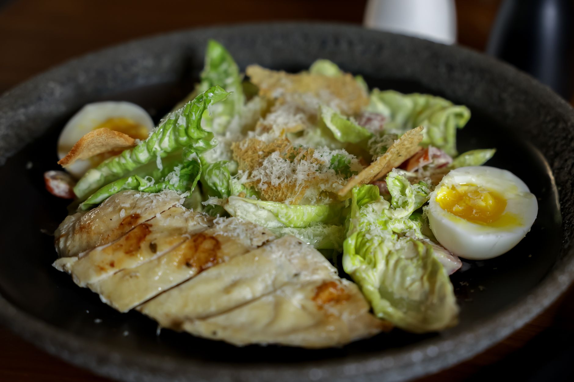 Sourdough croutons frying in olive oil