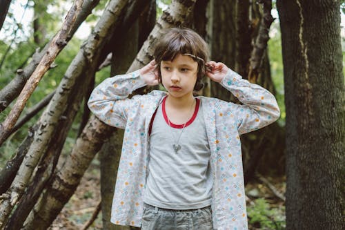 Free Boy Standing Near Trees Stock Photo