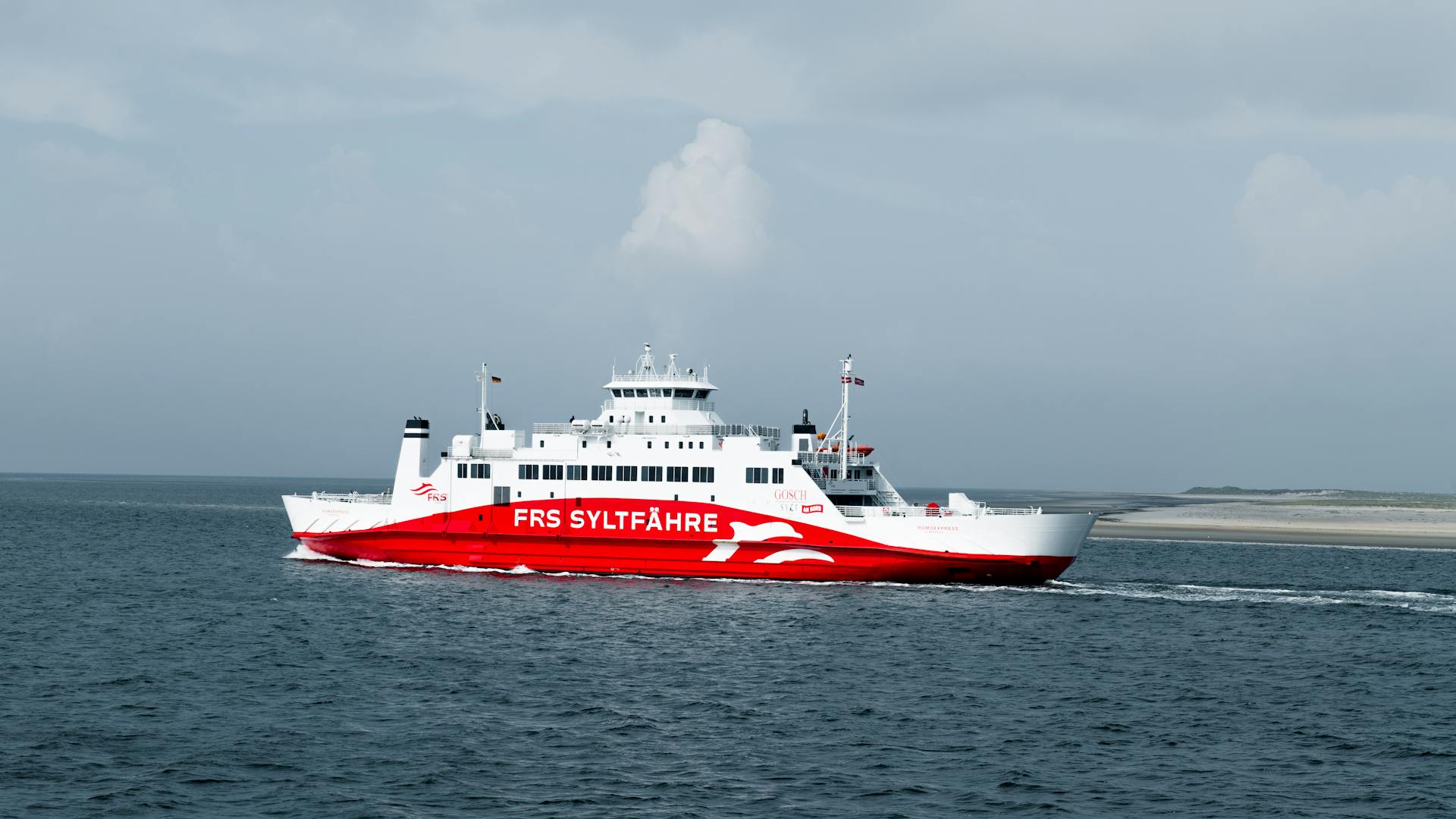 FRS Sylt ferry cruises through the North Sea near Sylt, Germany's scenic coastline.