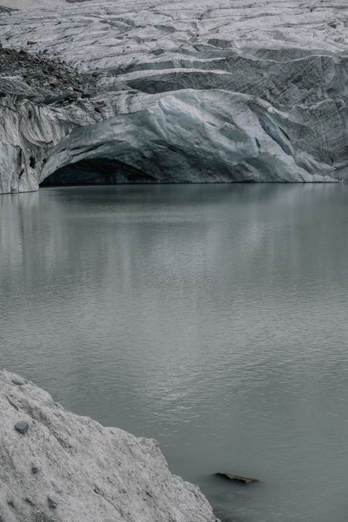 Free Stunning glacier scenery with a serene ice lake reflecting the cold, rugged landscape. Stock Photo
