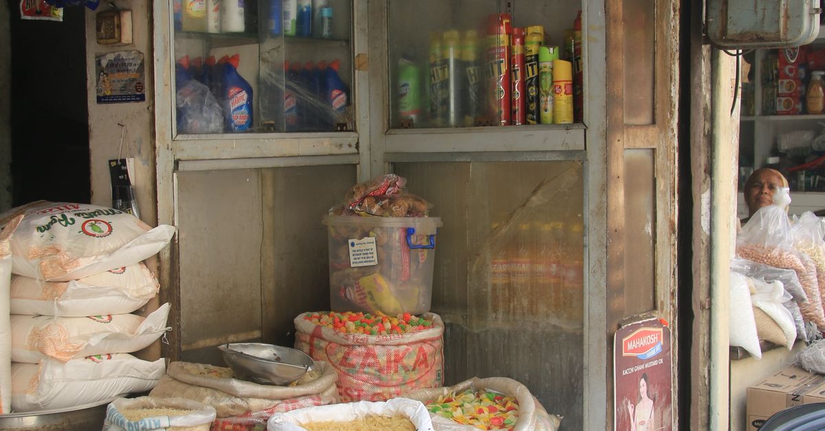 Traditional Indian Grocery Storefront with Supplies · Free Stock Photo