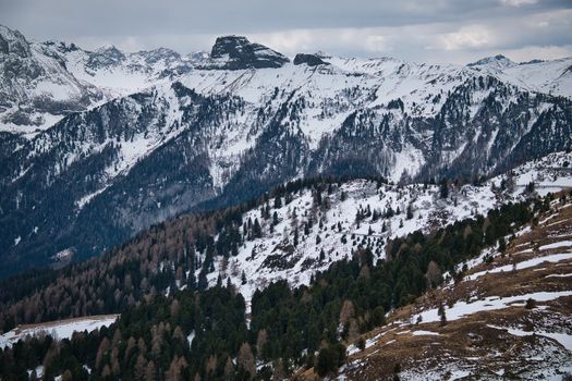 Breathtaking view of snow-covered Dolomites in Wolkenstein, Italy during winter.