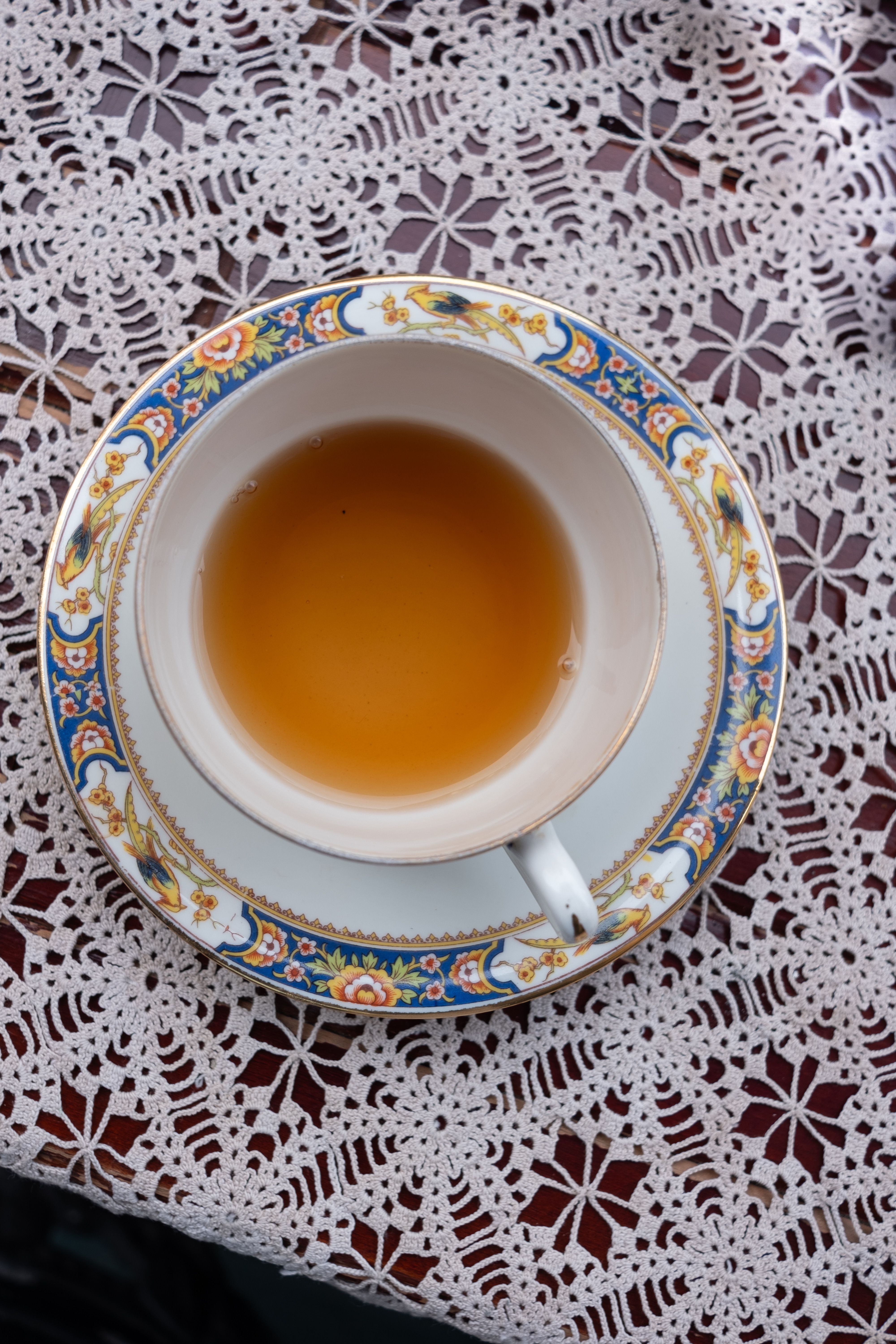 Elegant Tea Cup with Lace Tablecloth · Free Stock Photo