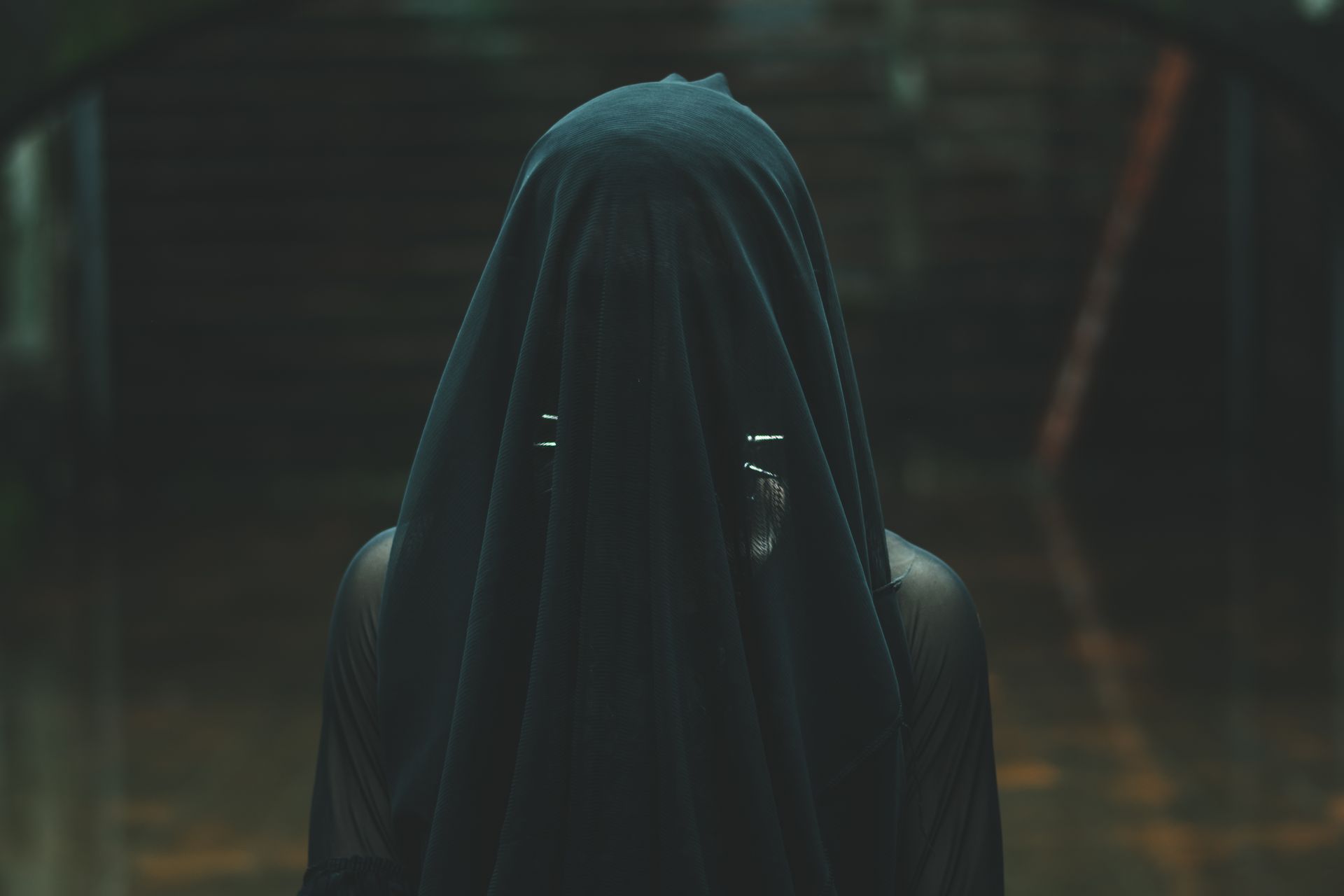 Person Covered with Black Textile
