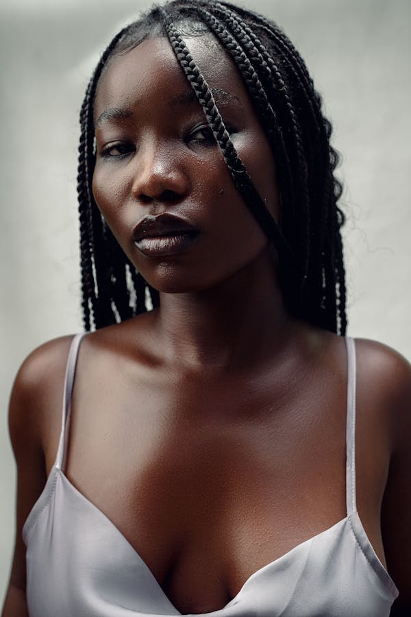 Elegant Black woman with braids