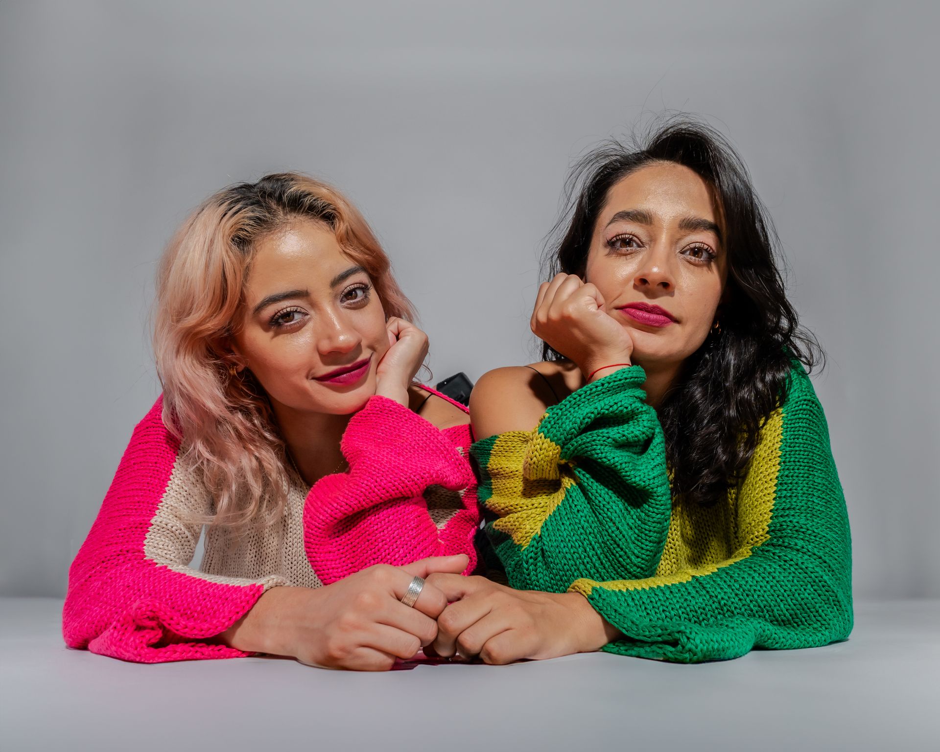 Vibrant Female Bond in Colorful Sweaters