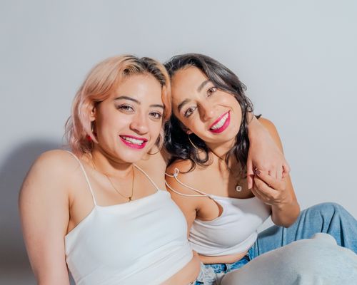 Free Charming portrait capturing the essence of friendship between two smiling women in Ciudad de México. Stock Photo