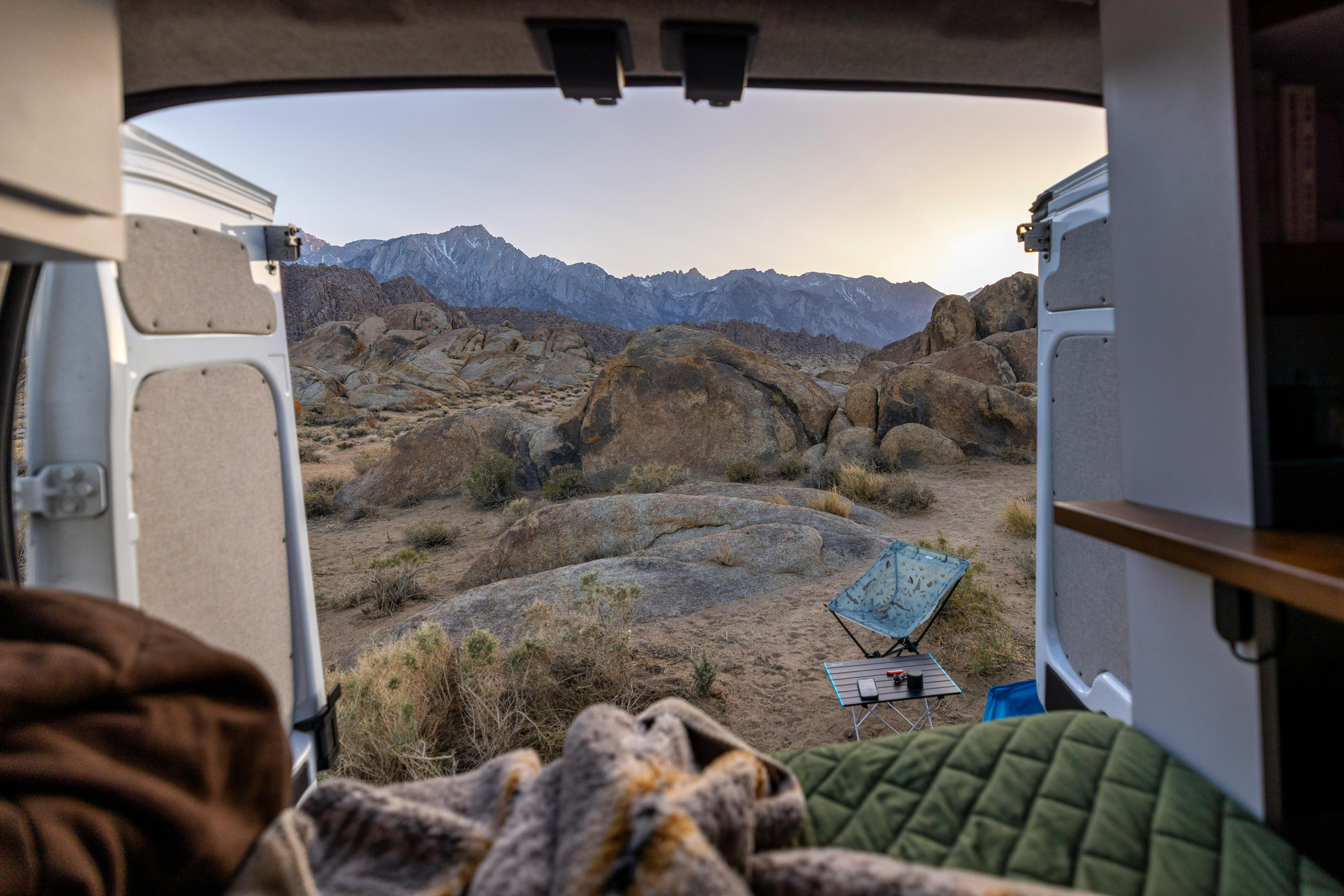 View from a van of a serene mountain landscape, perfect for adventure lovers.