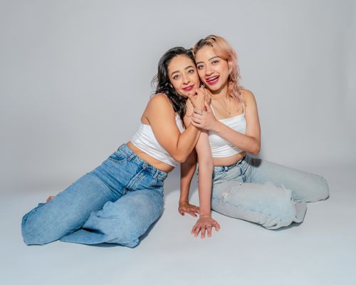 Free Two women embracing, showcasing friendship and empowerment with a joyful expression. Stock Photo