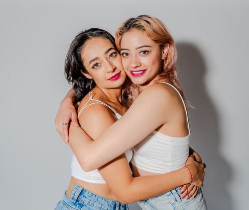 Free Two women sharing a tender embrace, showcasing friendship and connection. Stock Photo