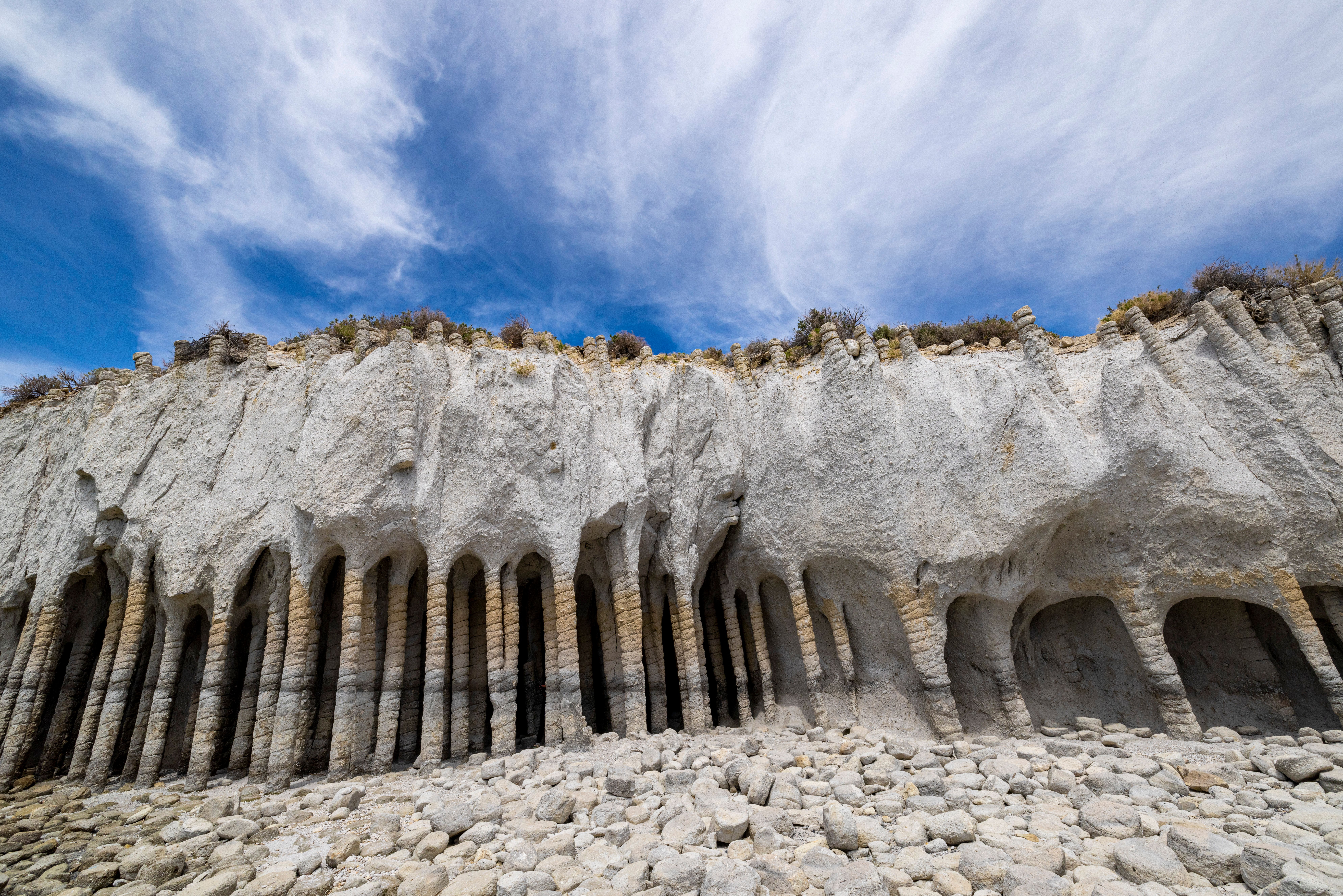 Dramatic Rock Formations Against Blue Sky · Free Stock Photo
