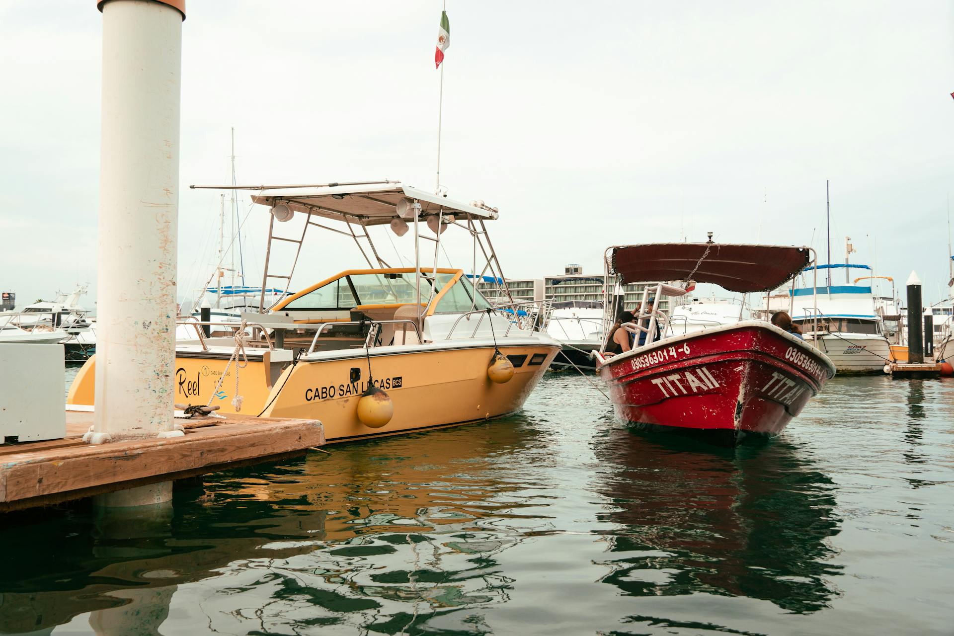 Scenic view of docked boats at Cabo San Lucas marina, ideal for travel imagery.