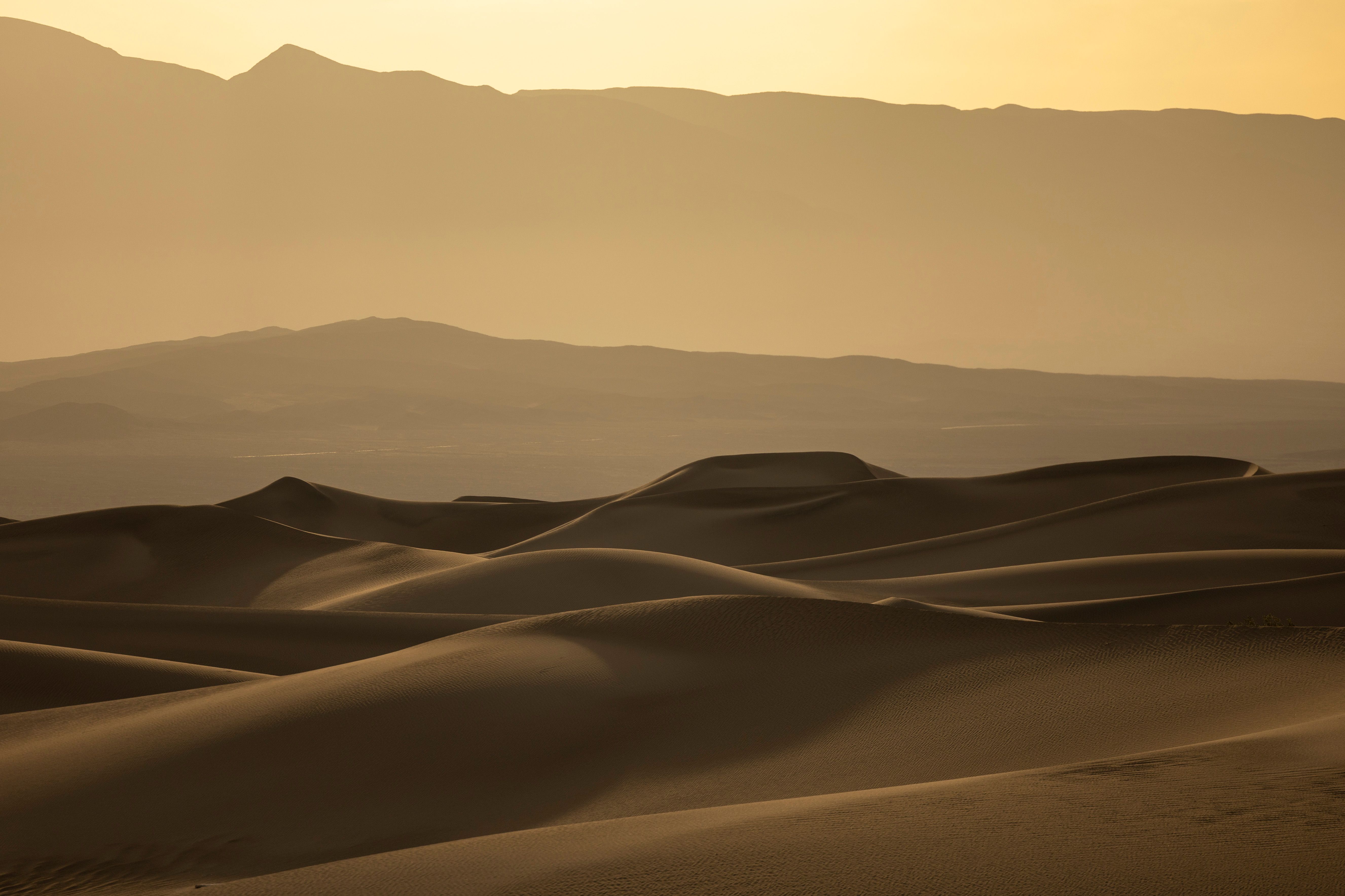 Golden Sand Dunes Under a Majestic Sky · Free Stock Photo
