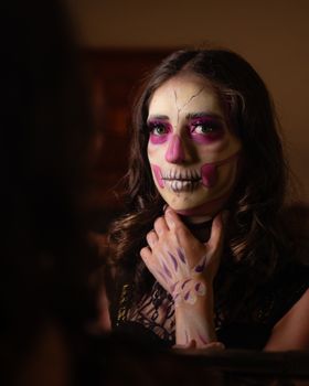 Portrait of a woman with Day of the Dead makeup in Ciudad de México.
