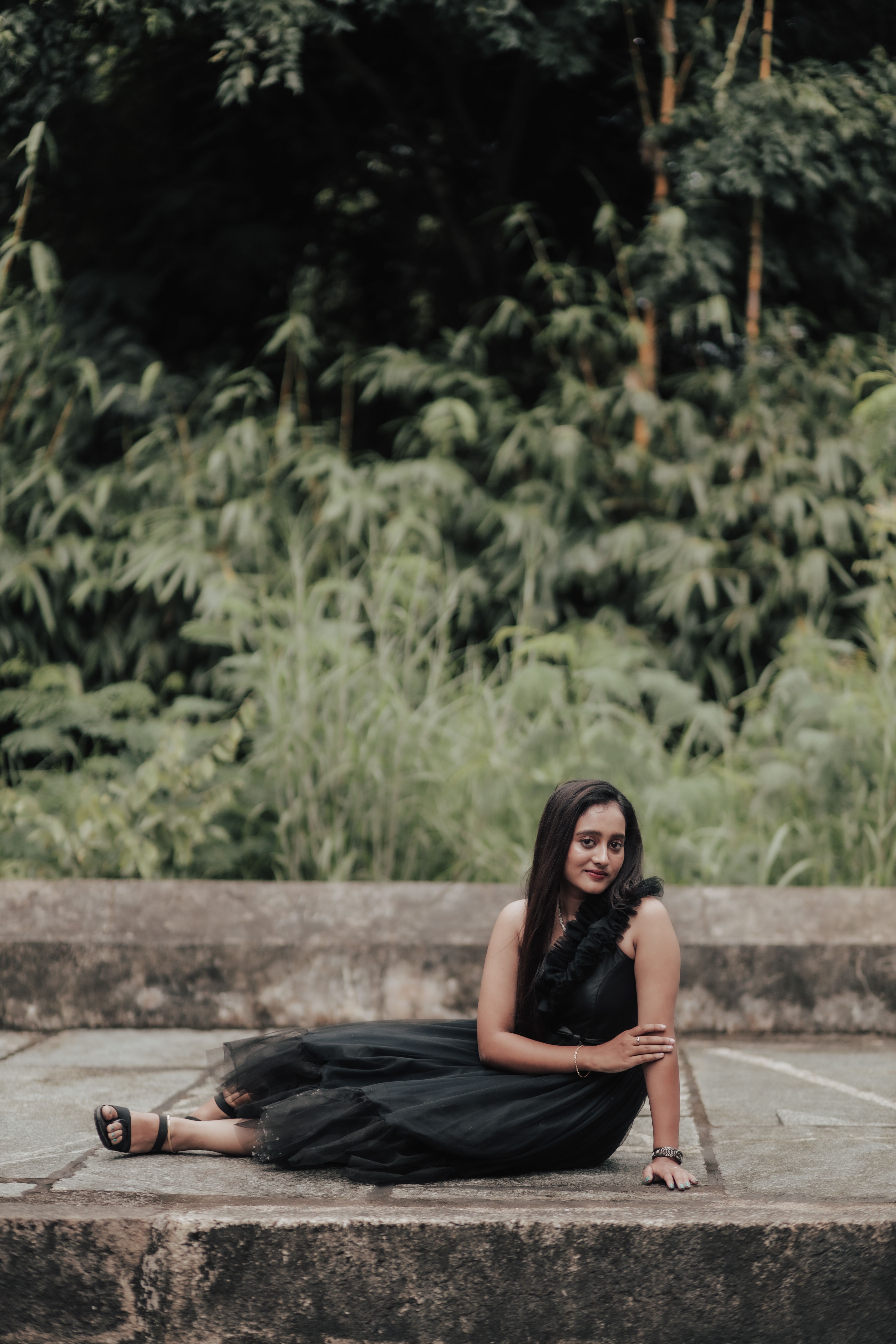 Elegant Woman in Black Dress Outdoors · Free Stock Photo